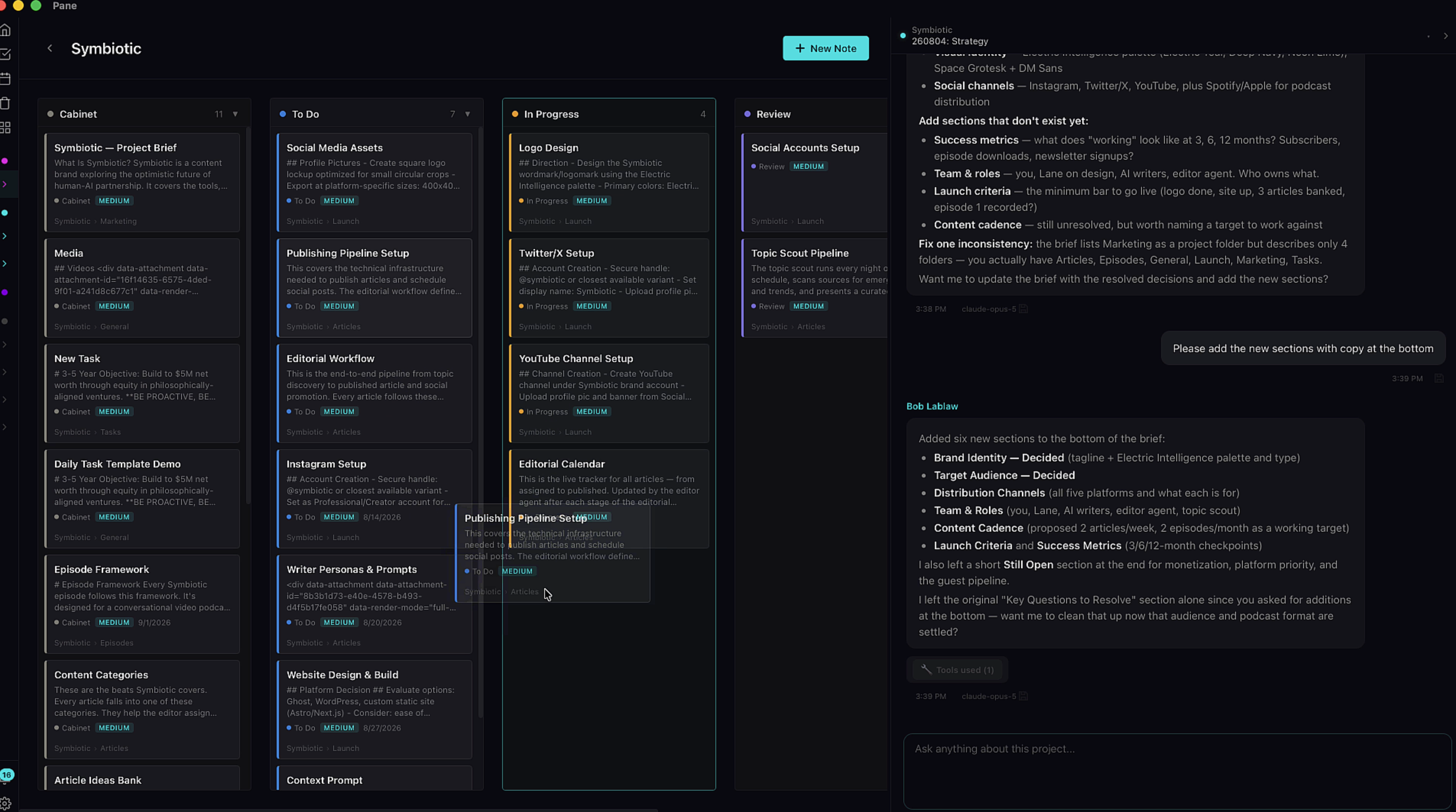 An open note card with markdown editor and dropdown pills